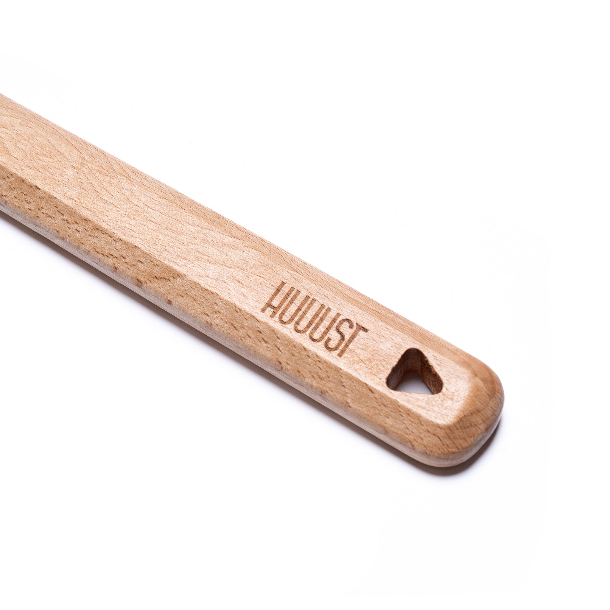 Detail dřevěné rukojeti kuchyňského náčiní HUUUST – přírodní design a ergonomický tvar